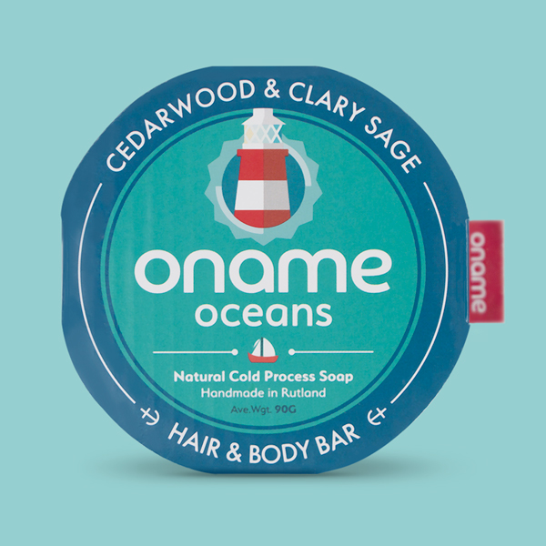 Oname Cedarwood & Clary Sage soap on a blue background