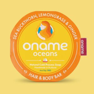 Oname Sea Buckthorn. Lemongrass & Ginger soap on an orange background