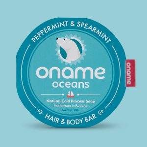 Oname Peppermint & Spearmint soap on a blue background