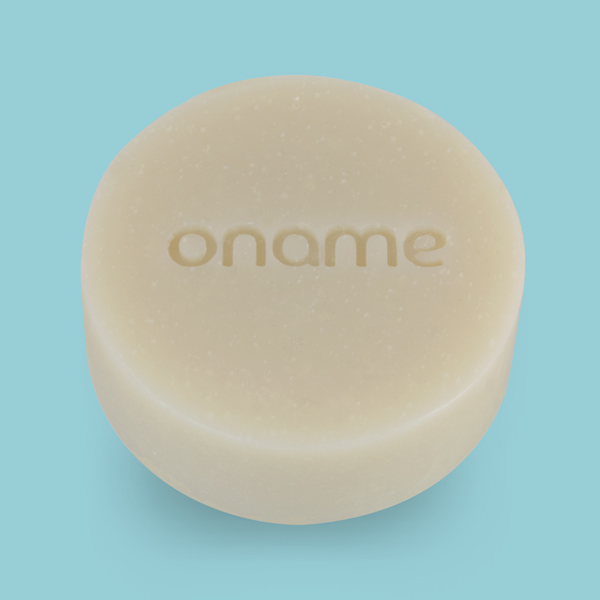 Oname naked Peppermint & Spearmint soap on a blue background