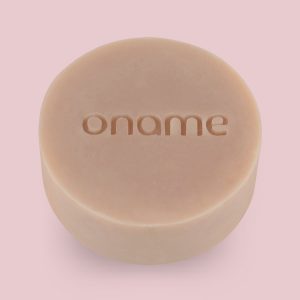 Oname Palmarosa, Lavender & Geranium Rose soap on a pink background