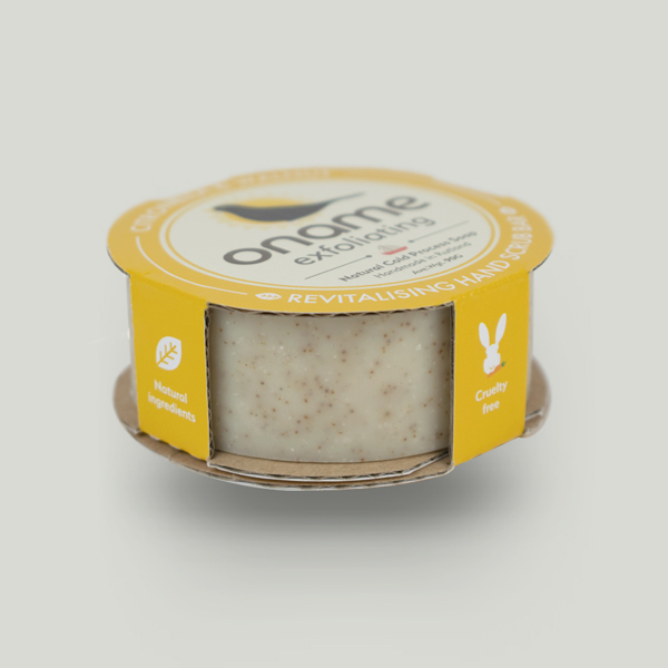 Oname Citronella & Walnut soap side view on grey background