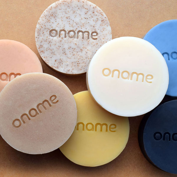 range of Oname soaps on brown background